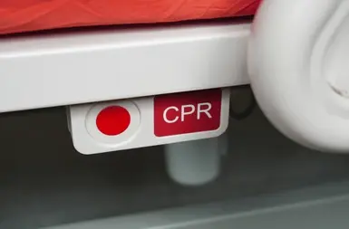 hospital bed CPR button.webp