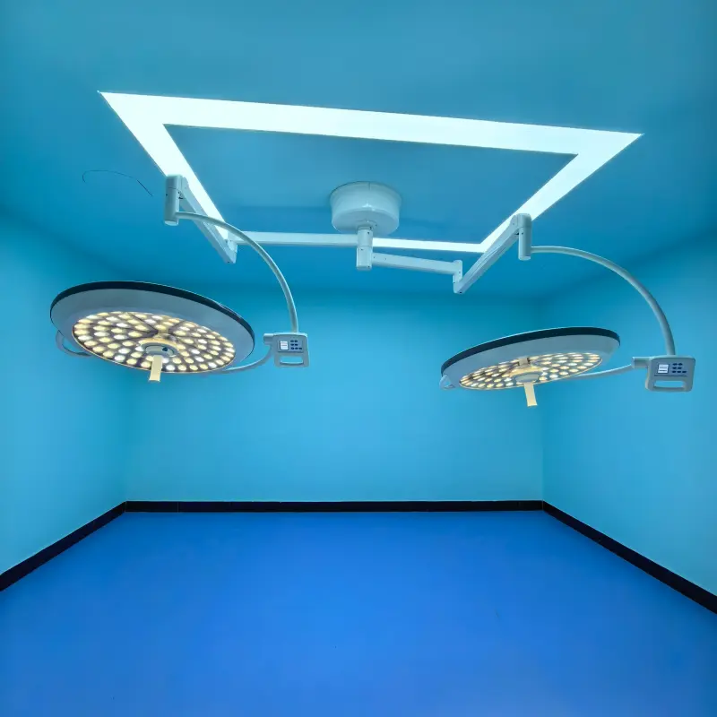 Dual-head adjustable color temperature surgical lights in an operating room.webp