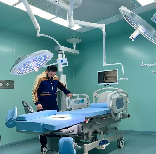LED surgical light with low heat output above an operating table.webp