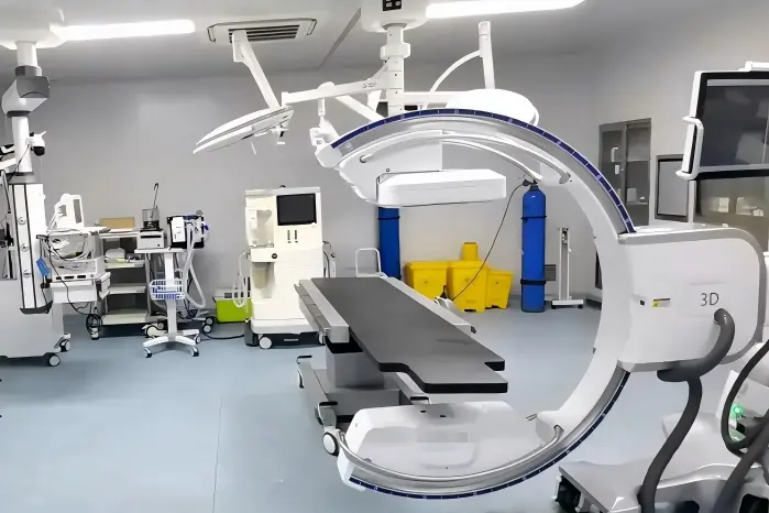 Operating room table clamp used with a C-arm imaging system.webp